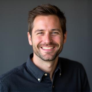 Professional headshot of James Harrington, founder of CompassBloom Navigators.