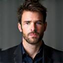 Professional headshot of David McCarthy, looking serious but approachable.